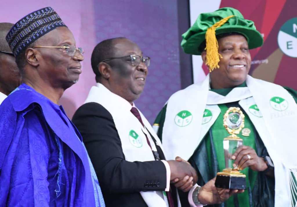 SHETTIMA GETS A SOUVENIR, SPARKS SMILES AT NES 66TH ANNUAL&nbsp;CONFERENCE