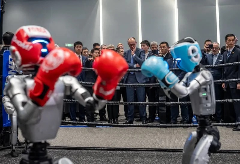 MERZ EXPLORES FORBIDDEN CITY, WATCHES ROBOT BOXING IN&nbsp;CHINA